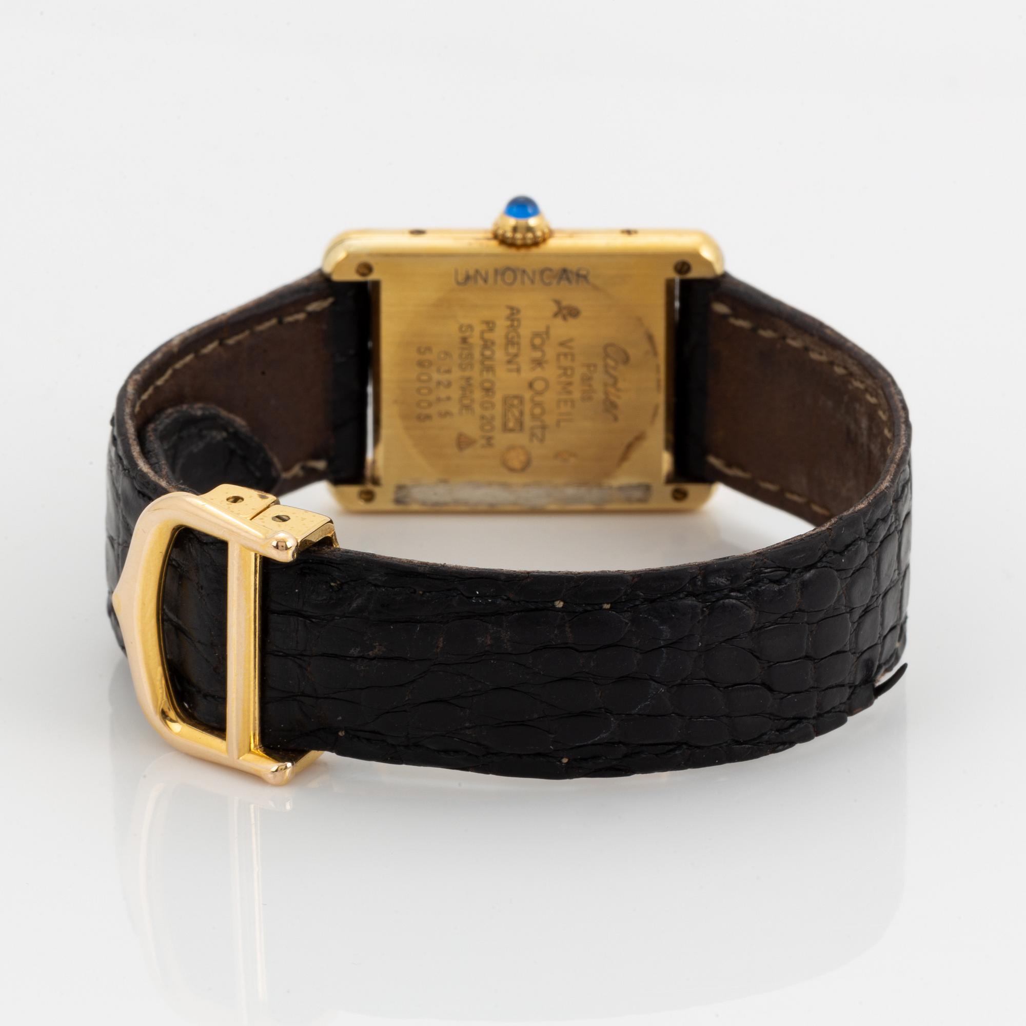 must de CARTIER, Tank, armbandsur, 23 x 23,5 (30,5) mm.