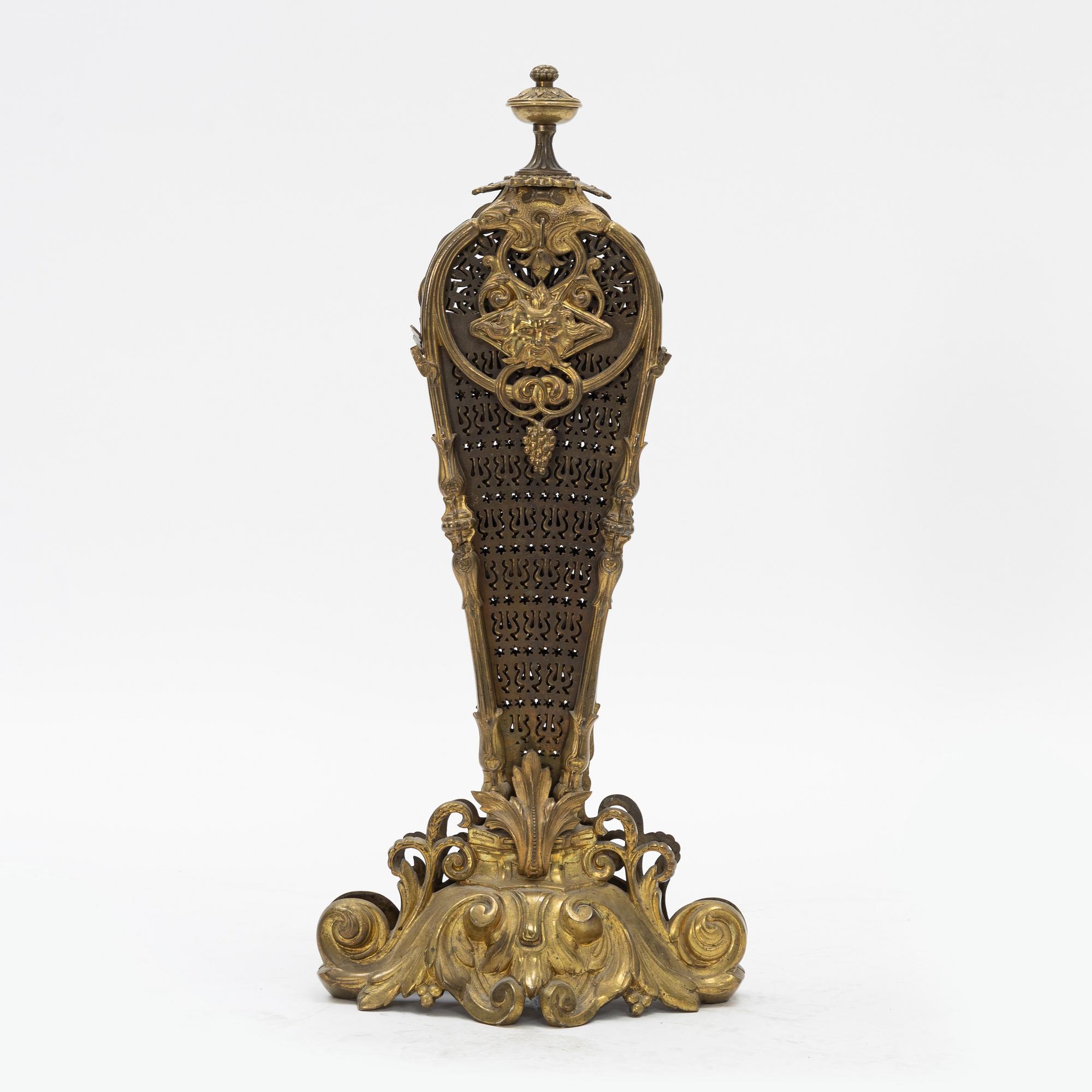 A brass fire grid, early 20th century.