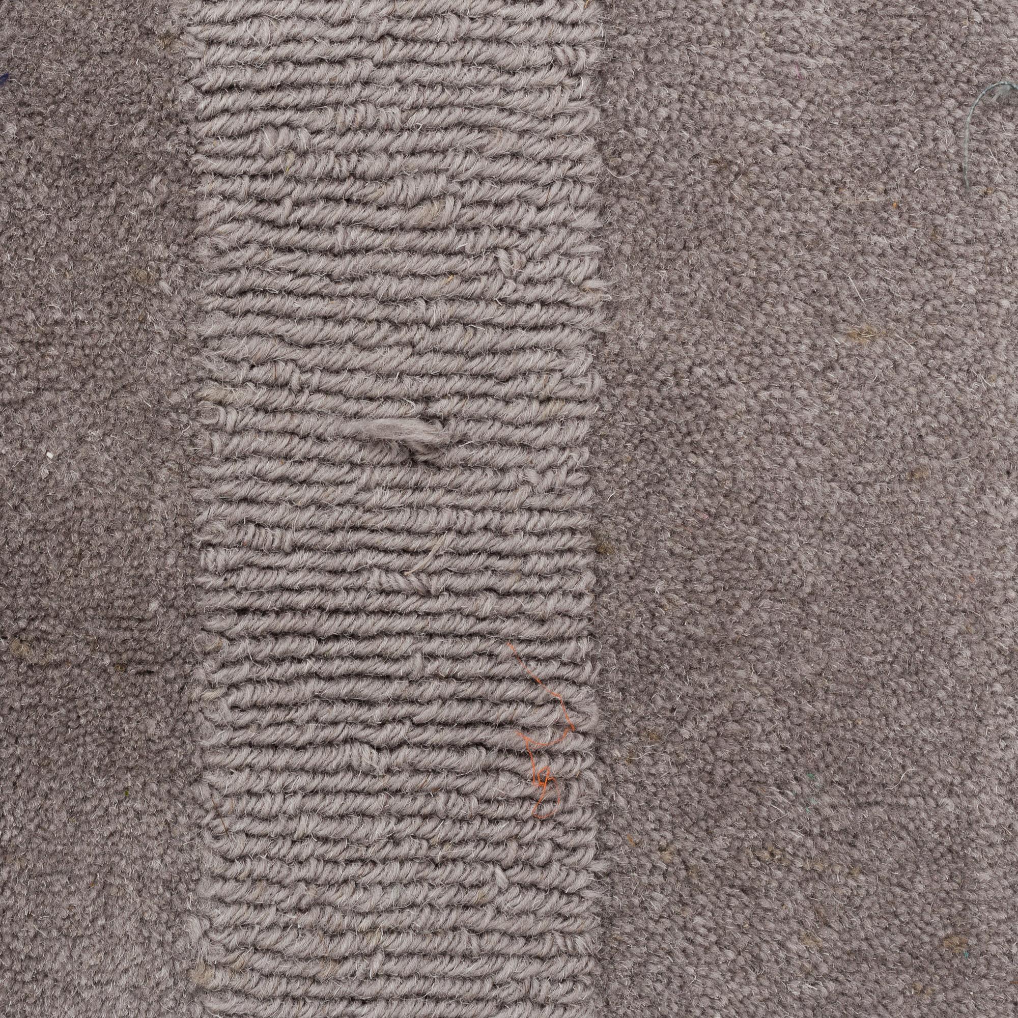 A Layered "Wool Cubes" carpet, 390x620 cm.