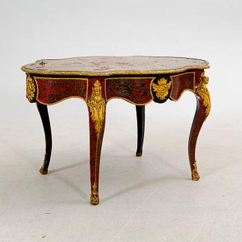 A Boulle style table around 1900.