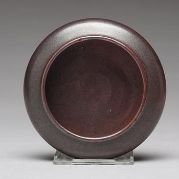 A iron dust glazed brush washer, Qing dynasty, 18th Century.