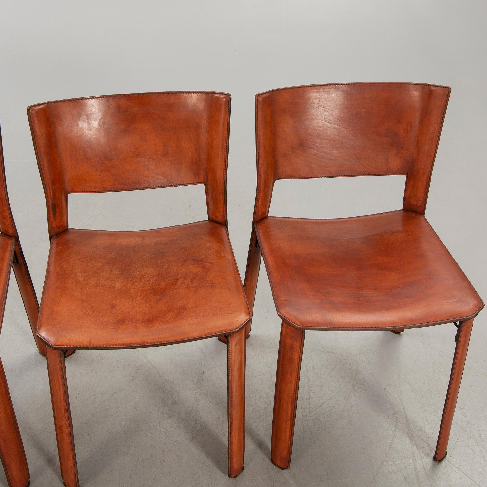 A set of four S-91 chrome and leather chairs from Fasem later part of the 20th century.