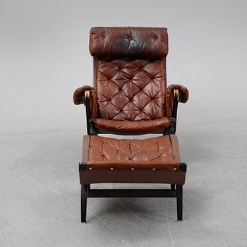 Bruno Mathsson,
fåtölj , "Pernilla 69" med fotpall, DUX, 1900-talets andra hälft.