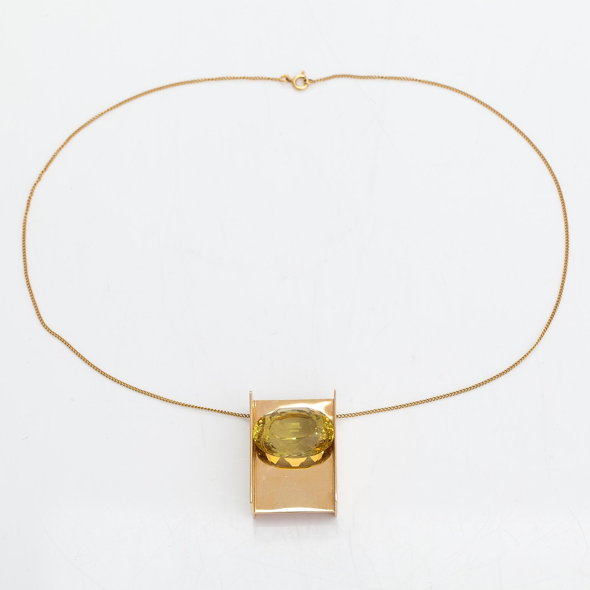 Markku Liitola, A 14K gold necklace/brooch with a heliodor/yellow beryl. Turku 1992.