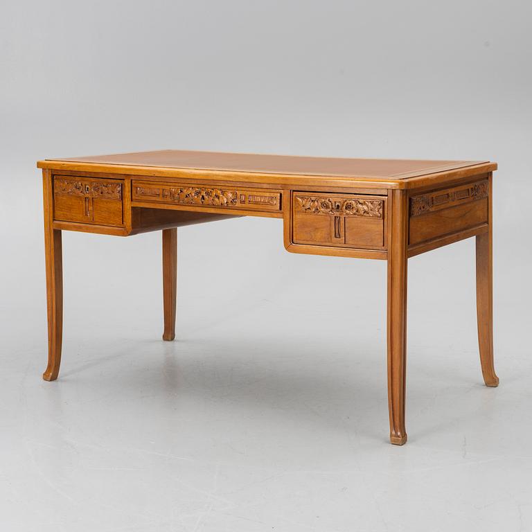An Art Nouveau desk and chair, early 20th century.
