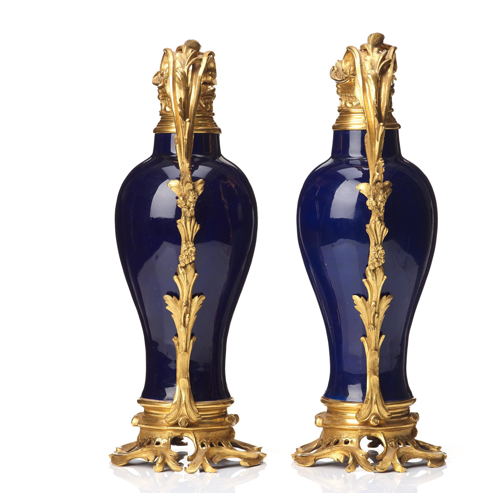 A pair of gilt bronze mounted vases, Qing dynasty, Qianlong (1736-95). French bronze mounts.