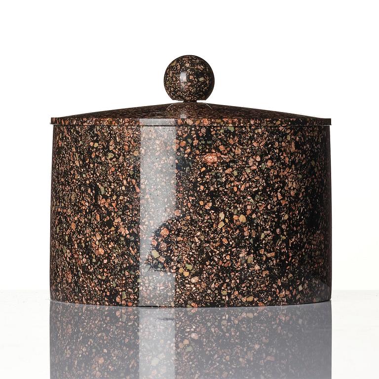 An Empire 'Orrlok' porphyry tobacco jar, Älvdalen, Sweden, early 19th century.