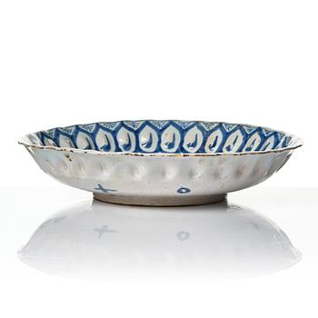 A group of three faience dishes, 18th century.
