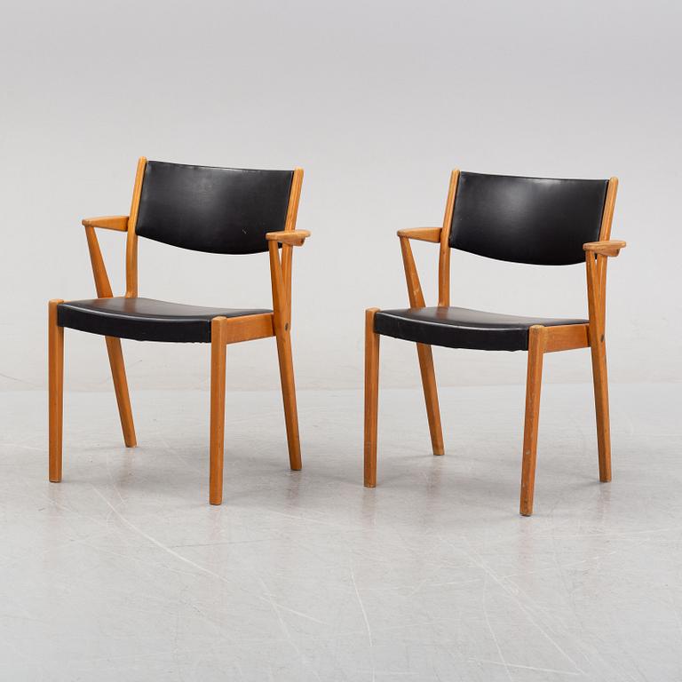 A pair of 1950's/60's armchairs.