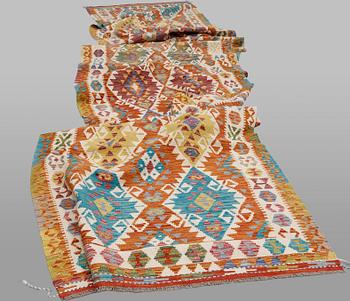 A Kilim runner, classic design, approximately 771 x 127 cm.