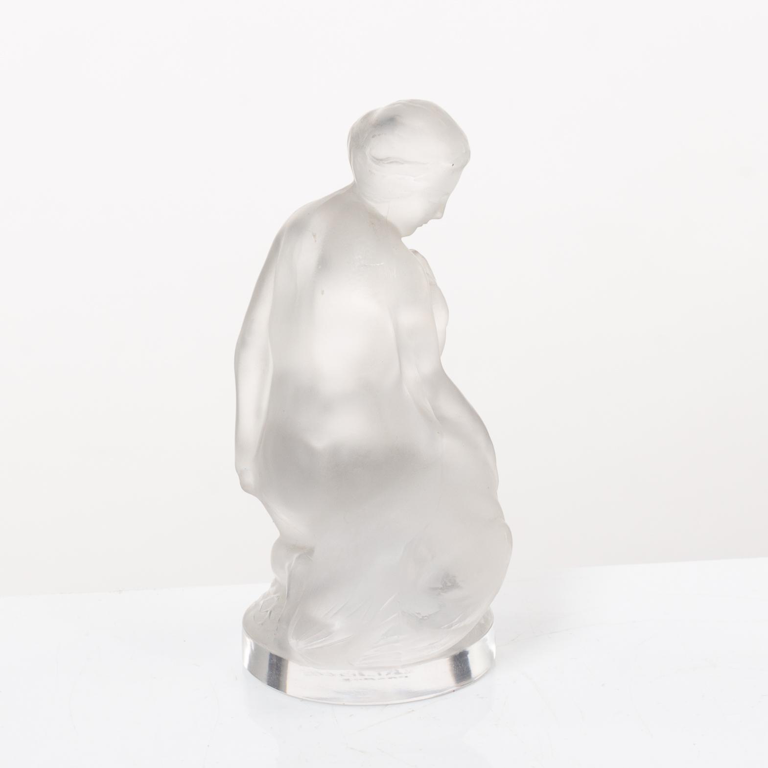 9 glass figurines, Lalique, France.