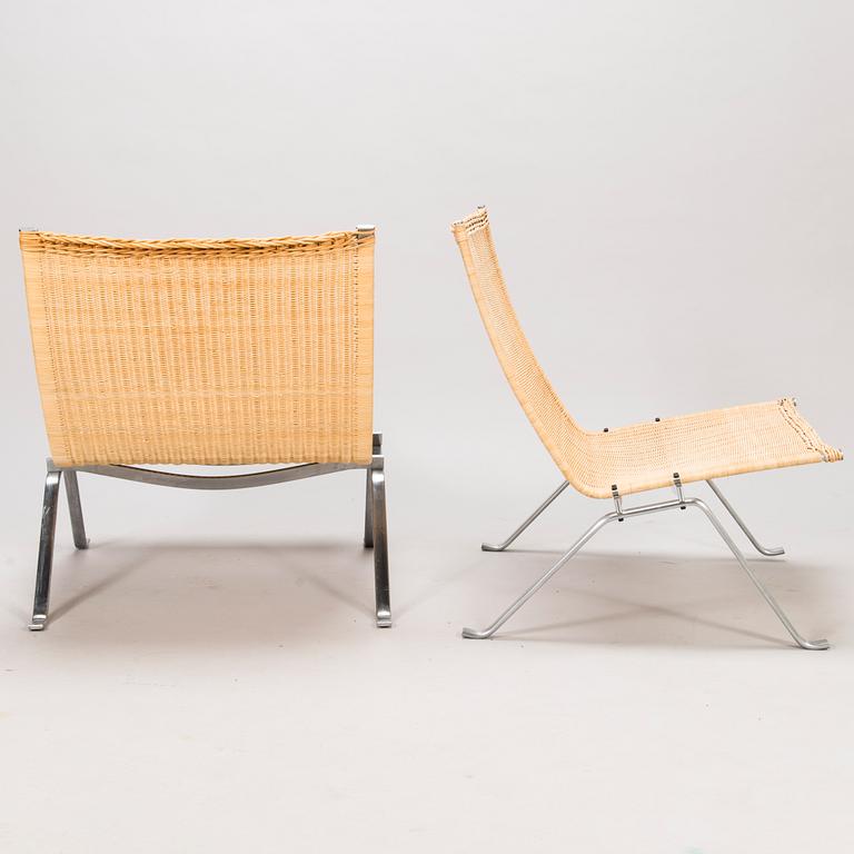 POUL KJAERHOLM, two 'PK-22' easy chairs, Fritz Hansen, Denmark 1999.