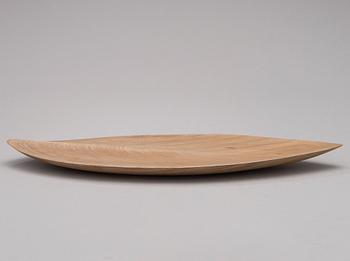 A 1950s plywood dish signed TW.