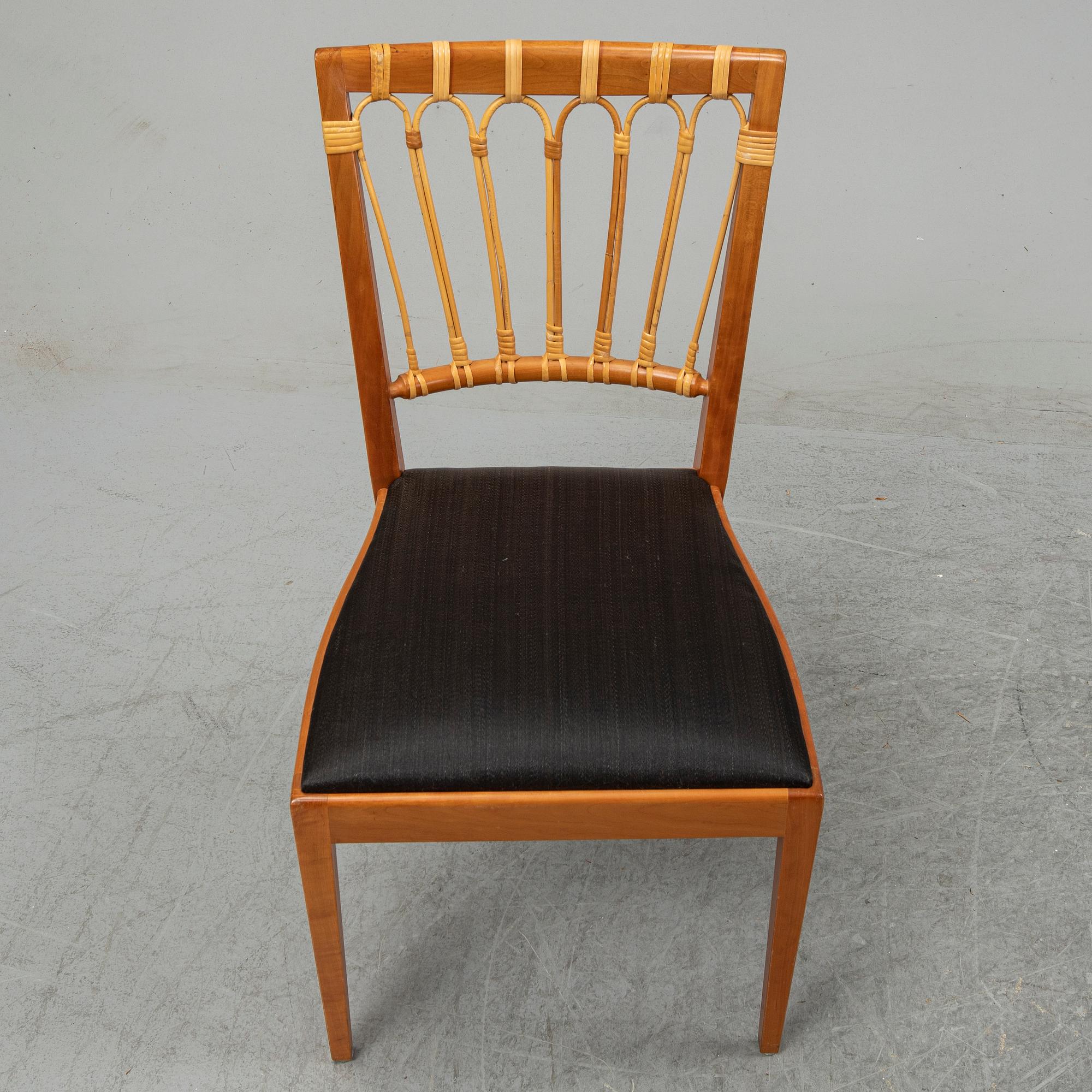 A set of four mahogany and rattan dining chairs, Josef Frank, , model 1165, Svenskt Tenn, Stockholm.