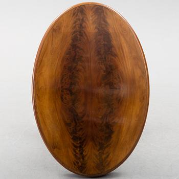 A mid 19th century mahogny table.