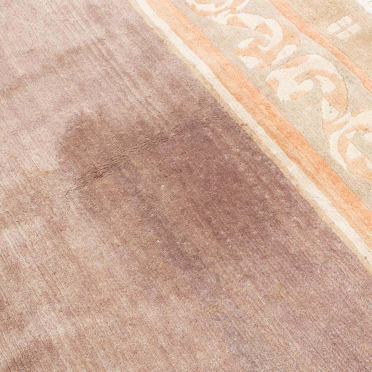 A carpet, Tibet, c. 245 x 357 cm.