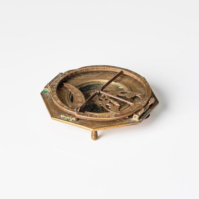 An engraved brass octagonal equinoctial compass sundial by Andreas Vogler (Augsburg, c. 1766-90).