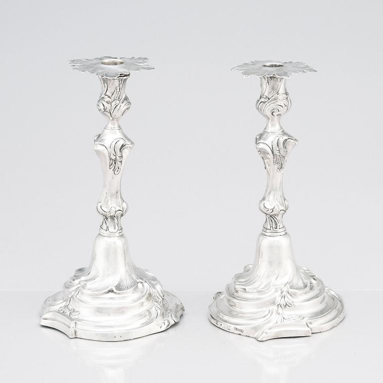 Two Swedish Rococo silver candlesticks, marks of Jakob Lampa, Stockholm 1764 and 1778.