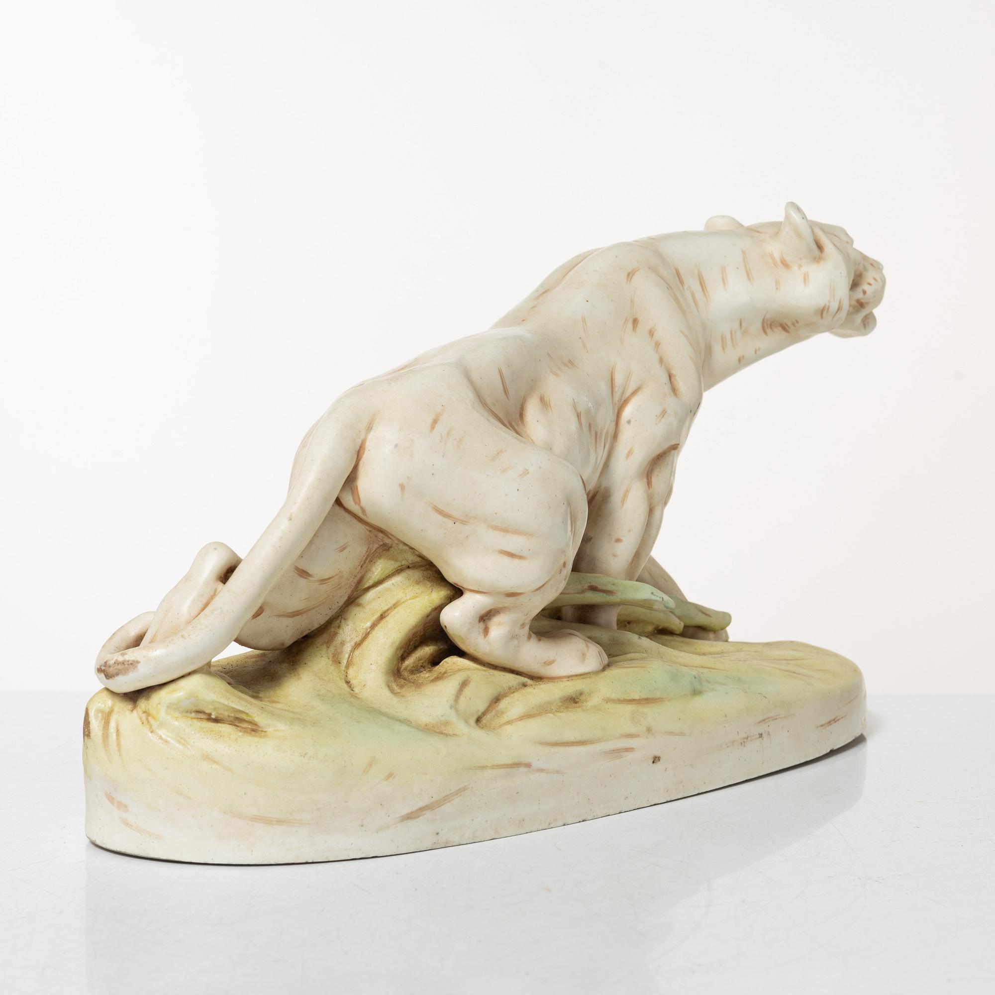 Otto Jarl, a porcelain figurin of a tiger, probably from Royal Dux, Germany.