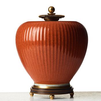 Knud Andersen, & ROYAL COPENHAGEN, a porcelain jar with patinated and gilt bronze cover and stand, Denmark mid 1900's.