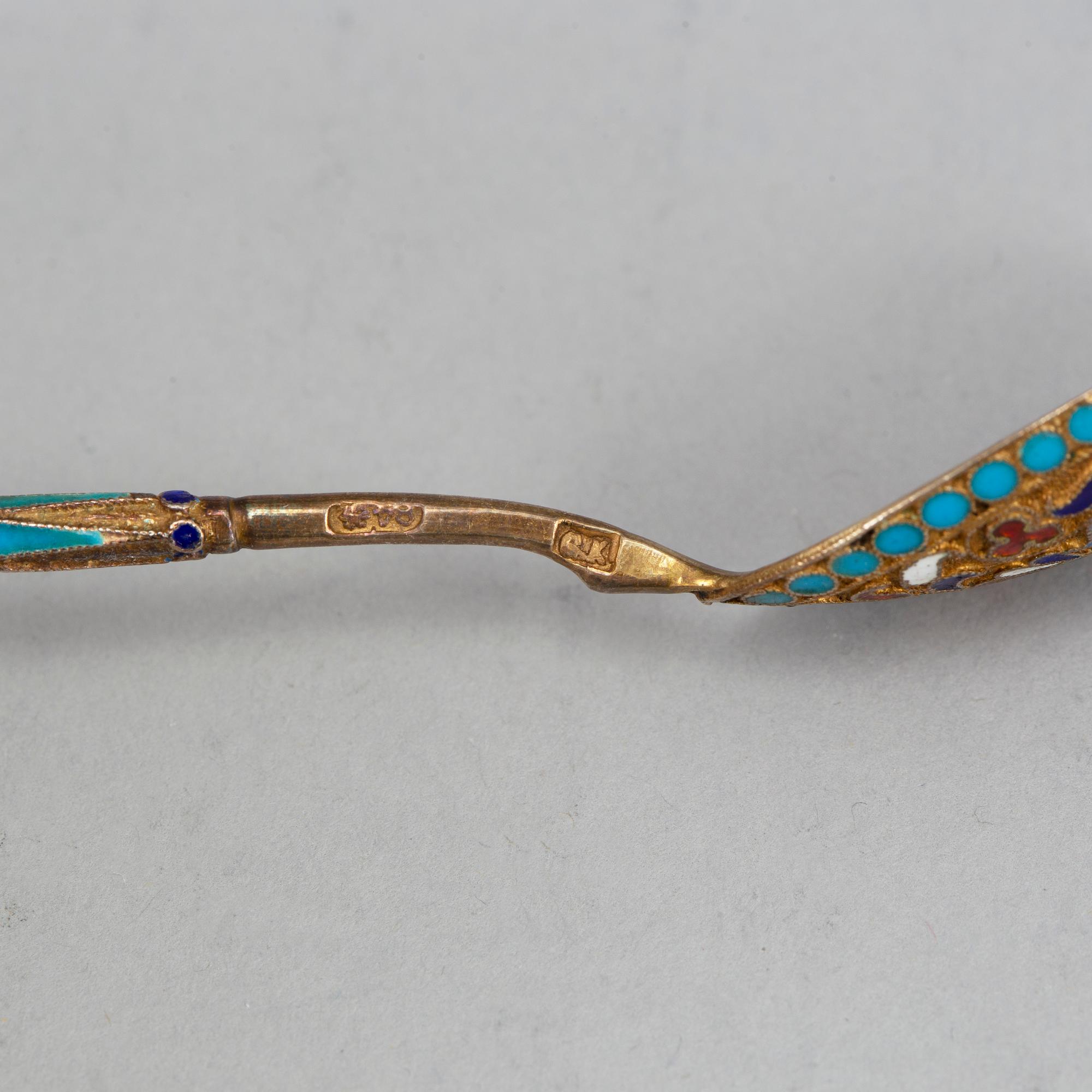 A set of twelve 19th century silver-gilt and cloisonné enameled tea-spoons, marked Gustav Klingert, Moscow 1880's.