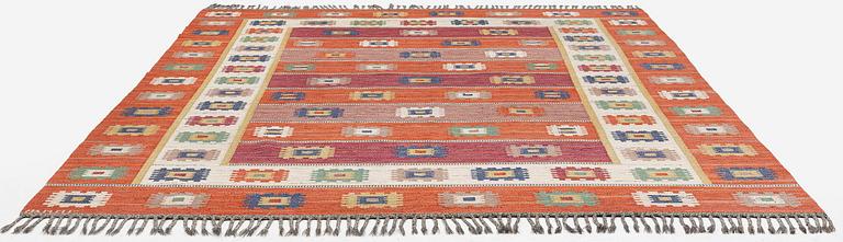 Märta Måås-Fjetterström, a carpet, 'Röd grön äng', flat weave, c. 345 x 251 cm, signed AB MMF.