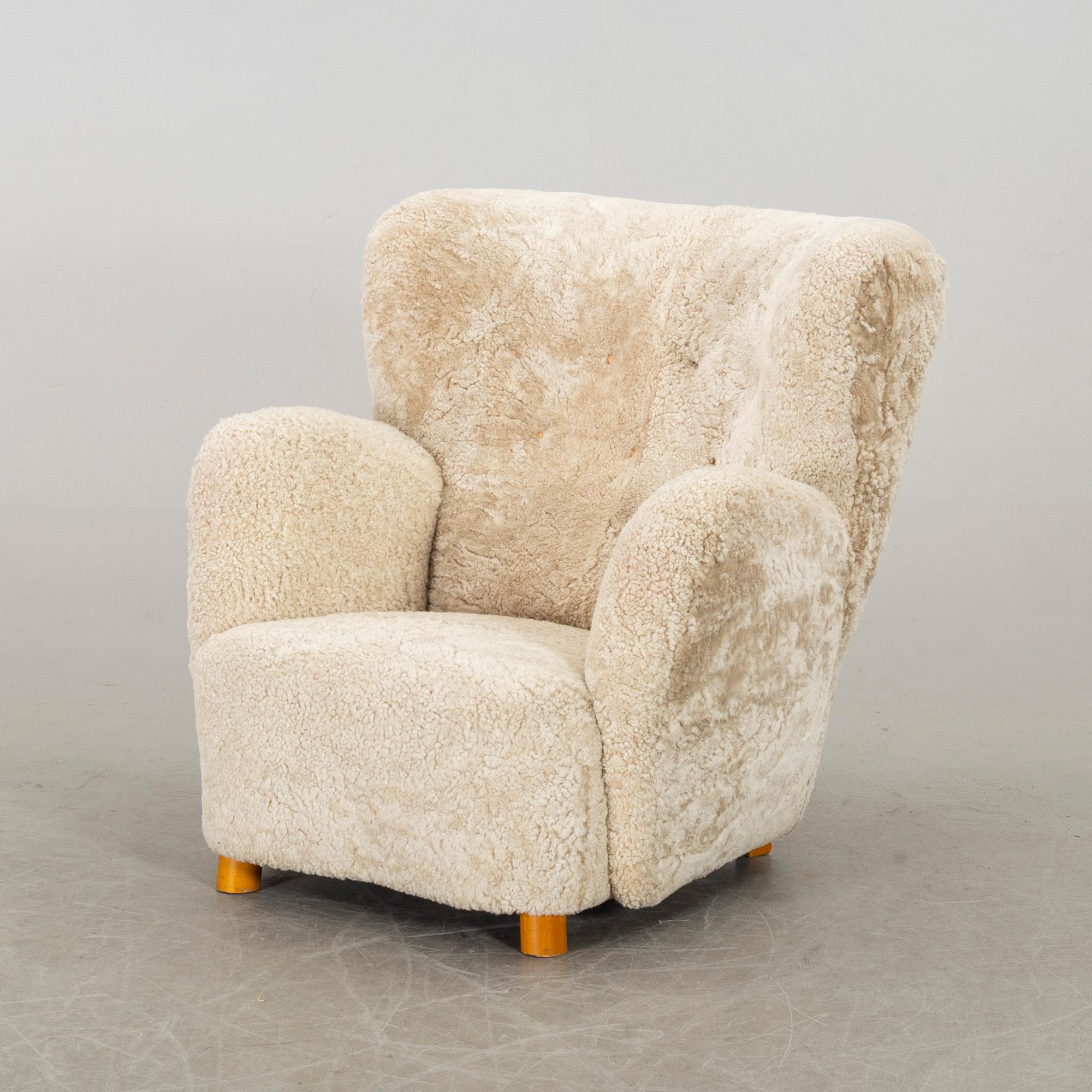 A DANISH SHEEPSKIN ARMCHAIR, 1940-50's.