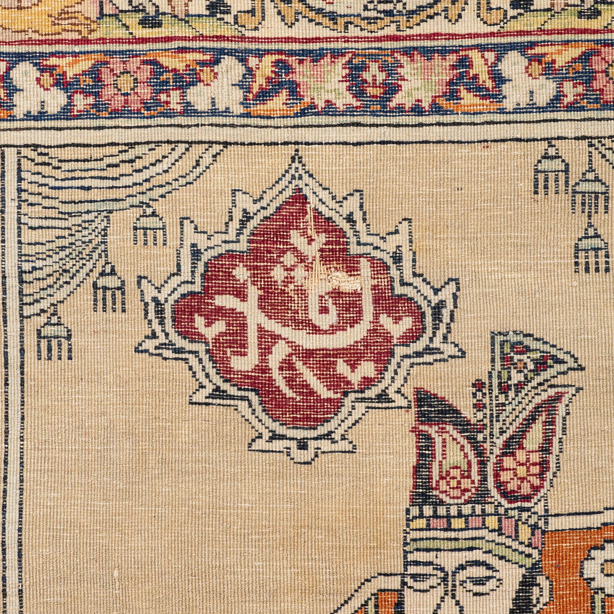 An antique Kerman Laver rug, South Persia, signed c.206 x 133 cm.