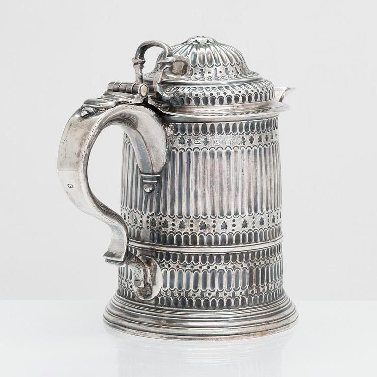 A sterling silver jug, London, unidentified marks.