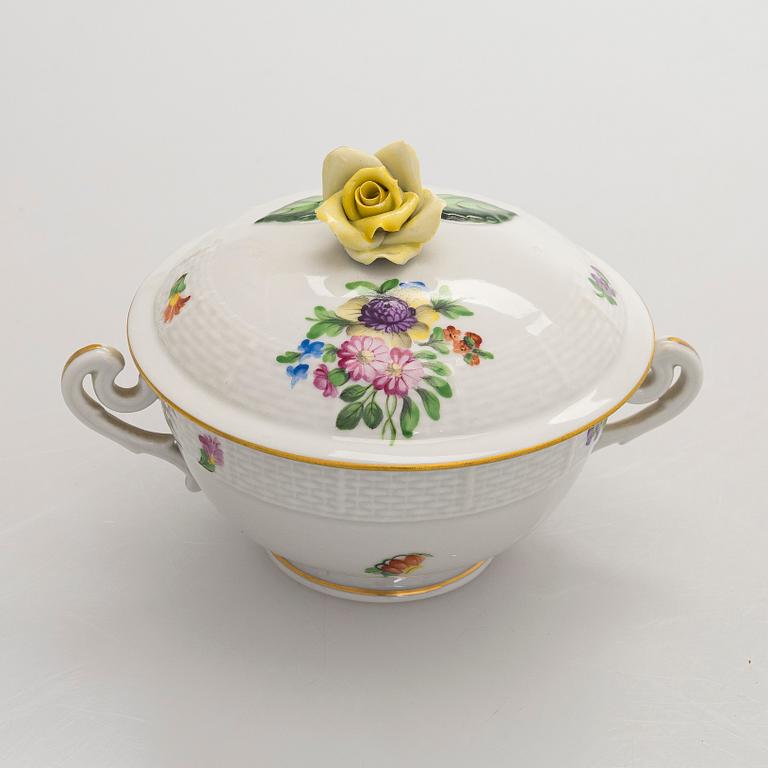 A pair of Herend porcelain candlesticks, and a lidded sugar bowl, Hungary.