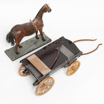 Horse-drawn carriage, early 20th century.