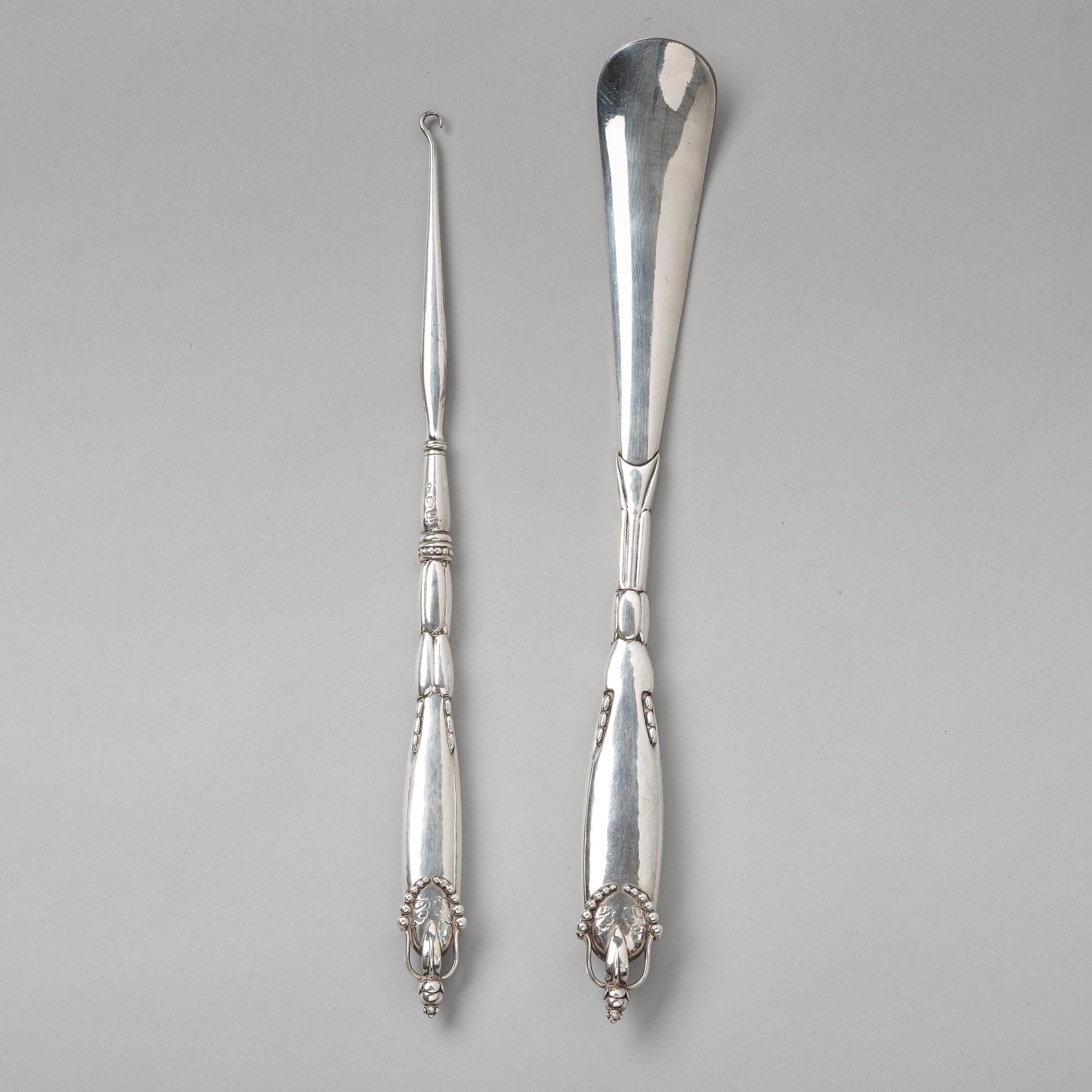 Georg Jensen, skohorn och kängknäppare, Köpenhamn ca 1918-20, 830/1000 silver.