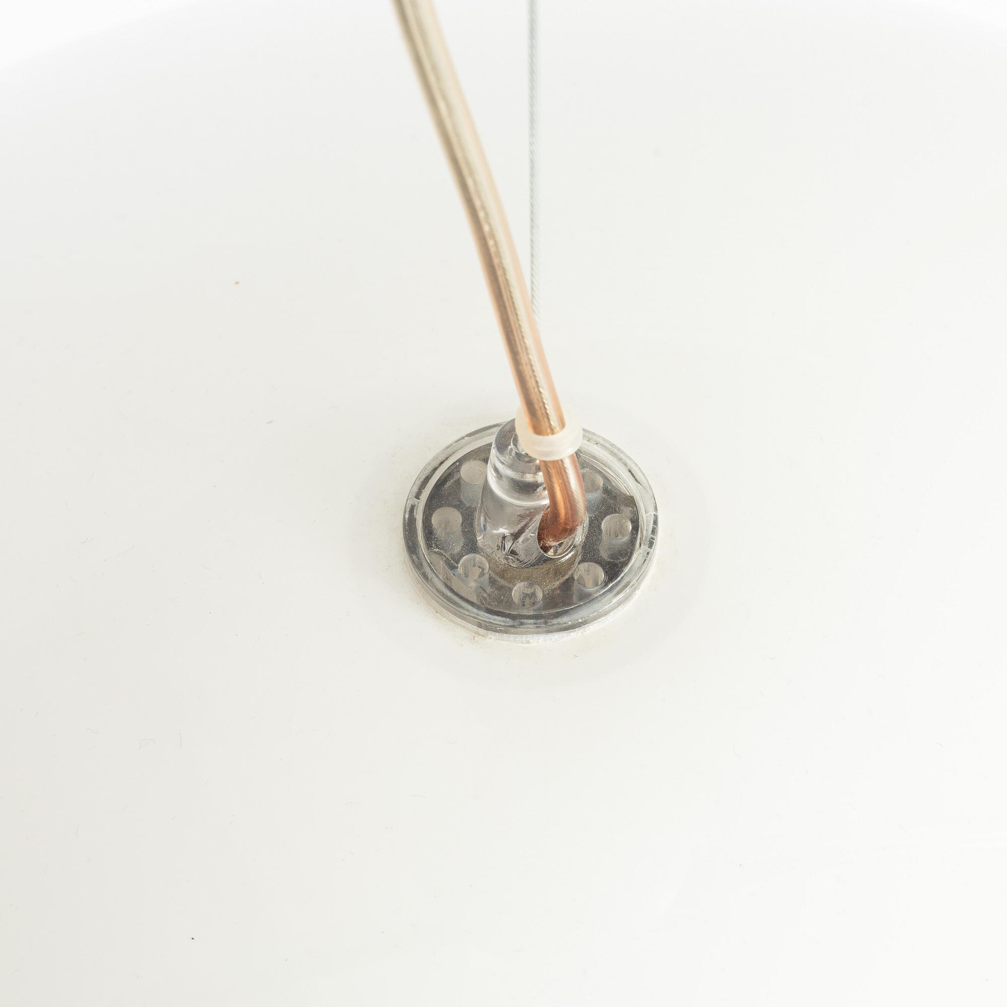 Ferruccio Laviani, a pair of pendant lamps, Kartell, 21st century.