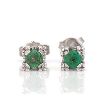 A pair of earrings with round, mixed-cut emeralds.