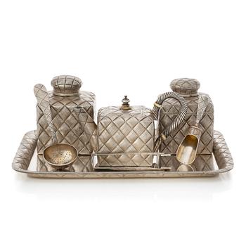 255. A  Russian parcel-gilt silver trompe l'oeil tea service, makers mark of Vasiliy Ivanov, St. Petersburg 1895.