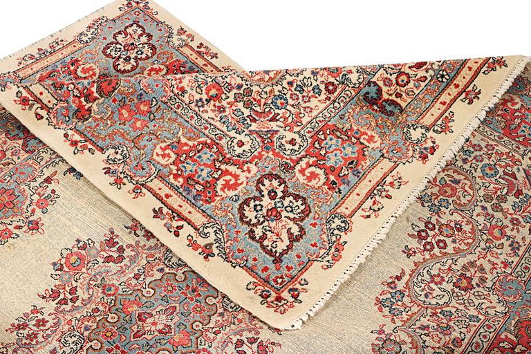 A Kerman carpet, c. 270 x 187 cm.