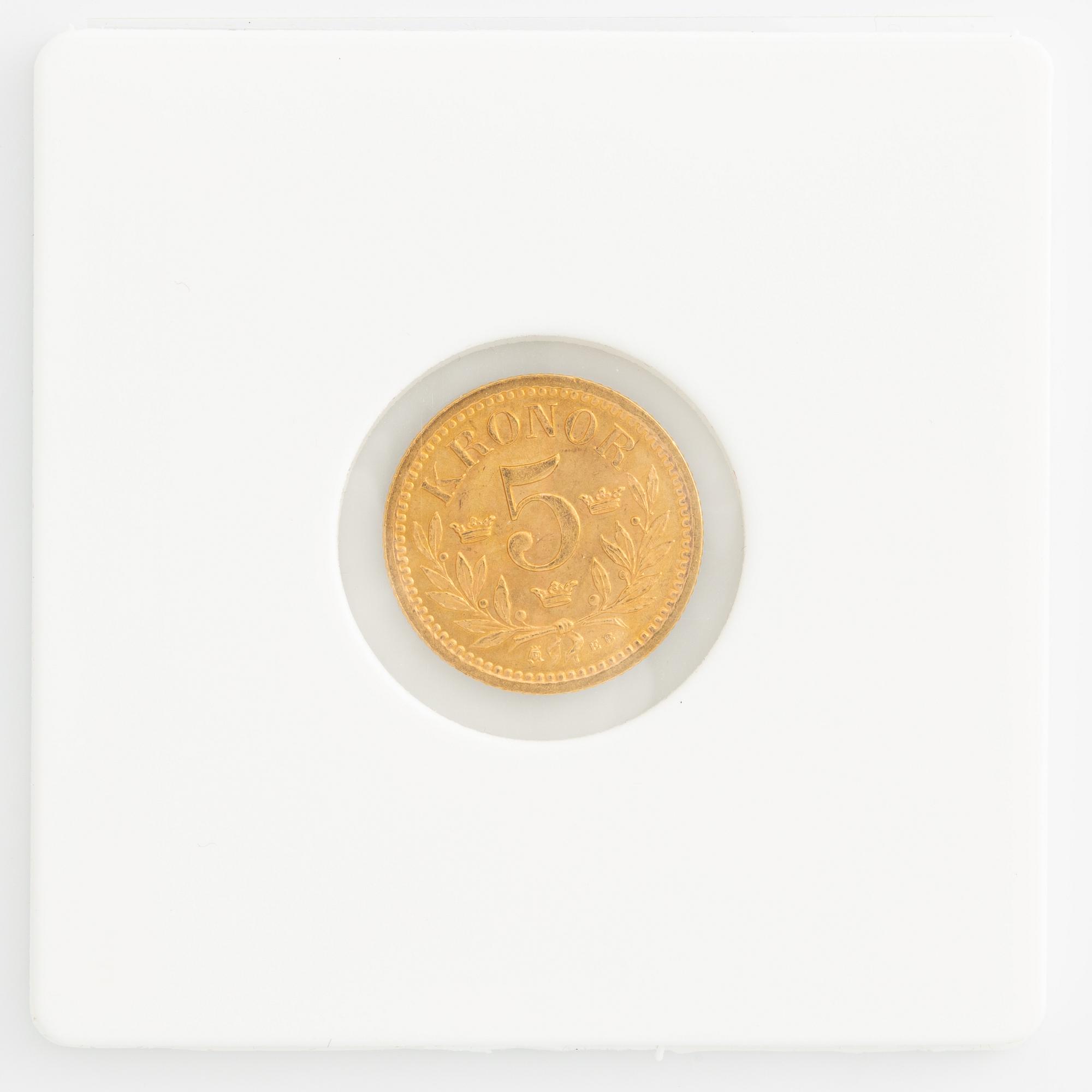 Two Swedish gold coins, 10 kronor and 5 kronor from 1874 and 1901.