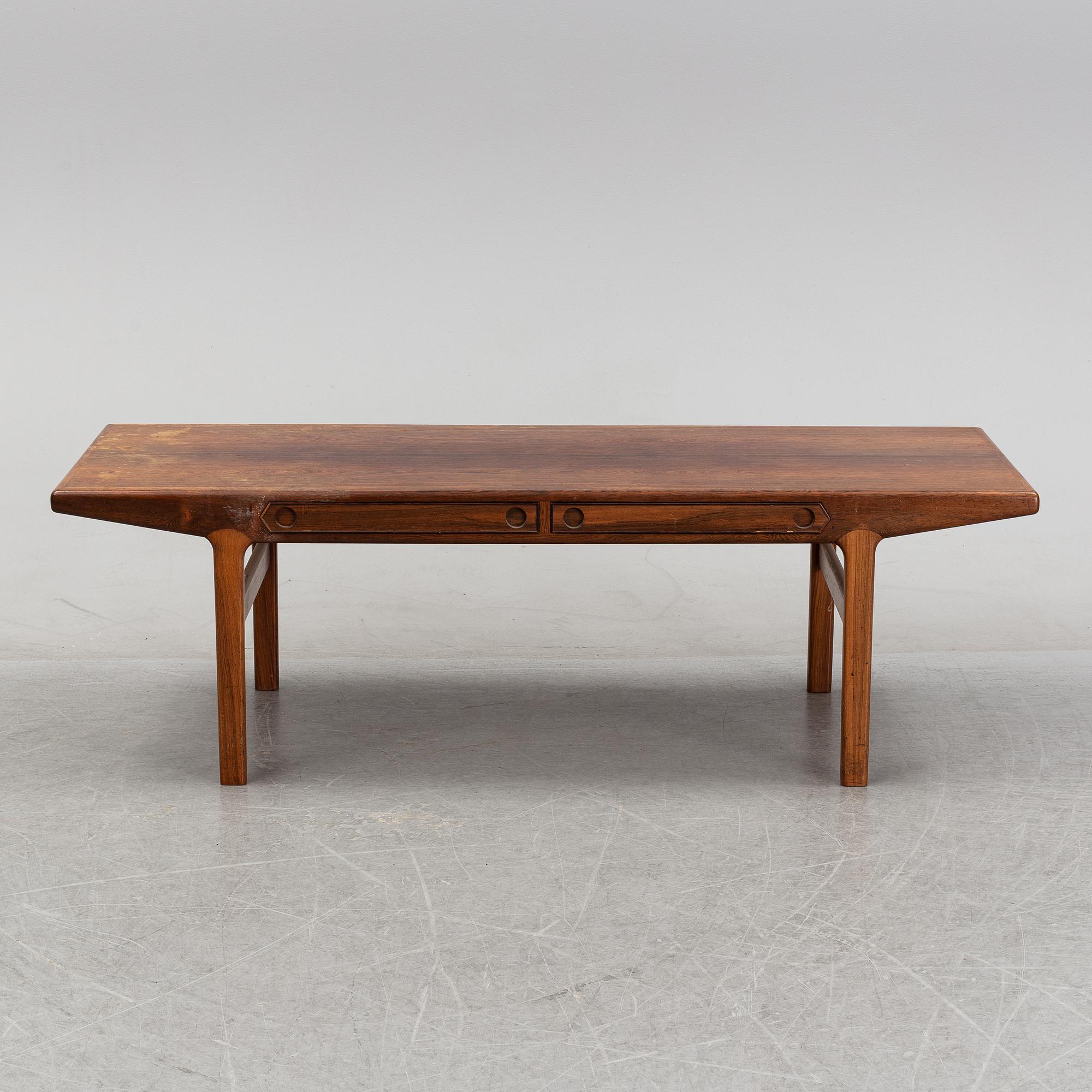 A 1950's/60's rosewood veneered coffee table.