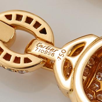 Cartier ett par örhängen 18K guld med runda briljantslipade diamanter.