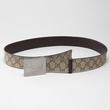 Two Gucci belts.