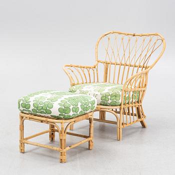 Josef Frank, Armchair with footstool, Firma Svenskt Tenn, model 311.