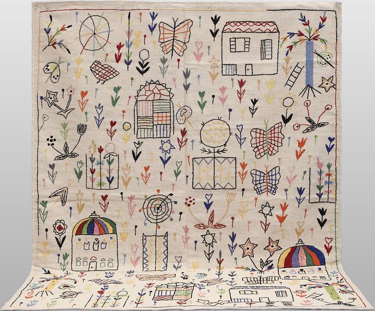 A Kilim carpet with hand-embroidered decoration, 239 x 182 cm.