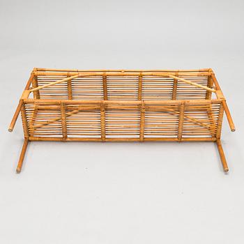 A mid 20th century rattan flower table.