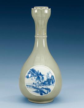 1377. A celadon ground blue and white vase, late Qing dynasty with Qianlongs  mark.