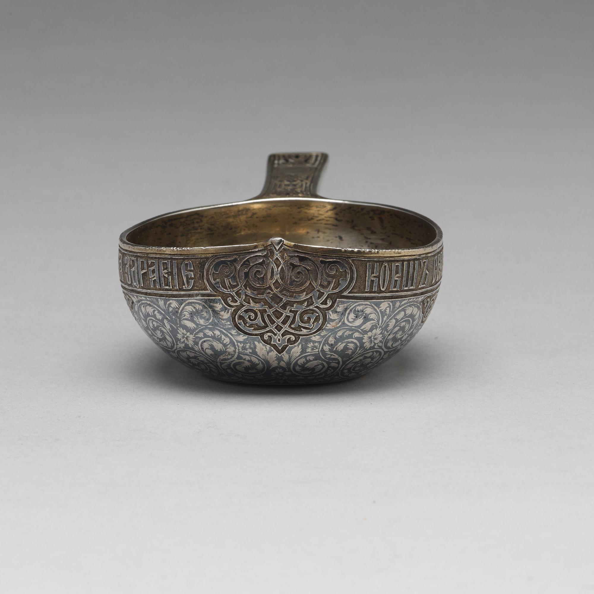 A Russian 19th century silver-gilt and niello kovsh, mark of Wasilij Semenow, possibly, Moscow 1872.