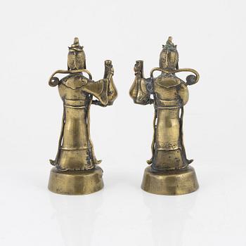 A pair of brass joss stick holders/vases, late Qing dynasty/around 1900.