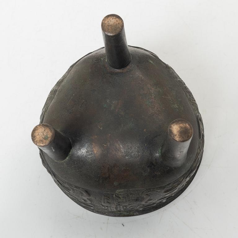A Chinese tripod bronze censer, Ming style, Qing dynasty (1644-1912).
