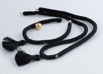 A bracelet, necklace and a clasp by Ole Lynggaard.