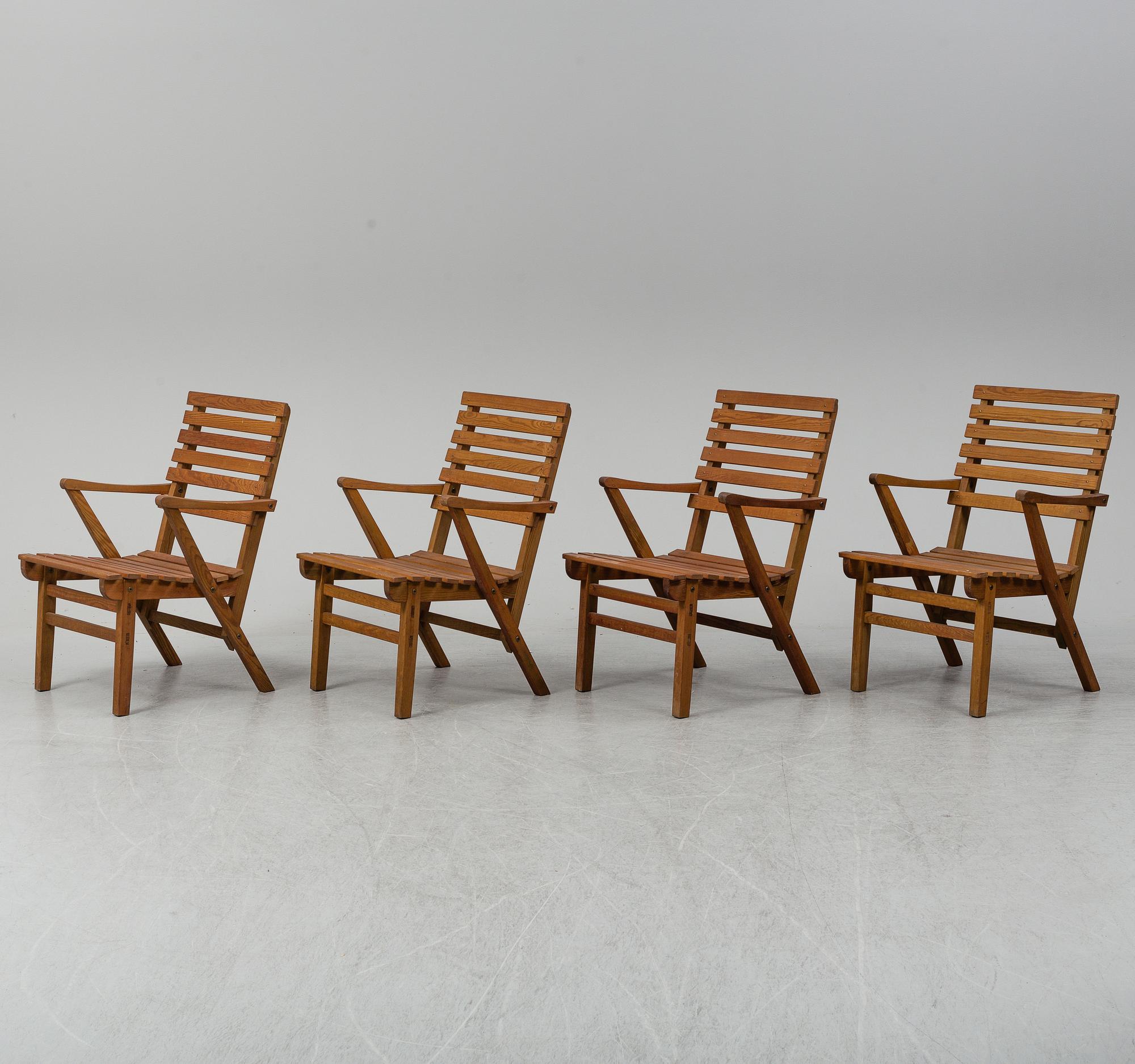A Carl Malmsten "Bergshamra" garden table and four chairs, first half of the 20th century.