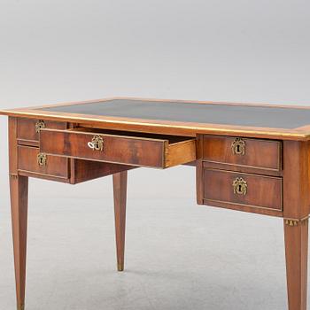 A circa 1900 late Gustavian mahogany veneered desk.